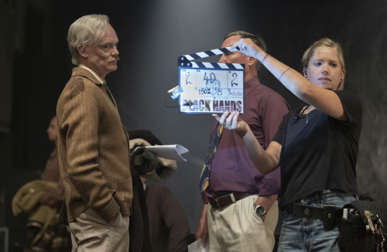 Clapperboard on set of Black Hands